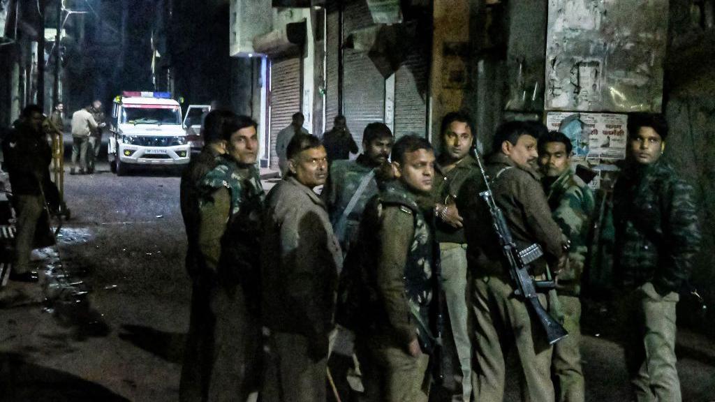 Armed police personnel stand guard following religious violence near the Shahi Jama Masjid in Sambhal on November 24, 2024. Indian Muslim protesters clashed with police on November 24, with at least two people killed in riots sparked by a survey investigating if a 17th-century mosque was built on a Hindu temple. (Photo by AFP) (Photo by -/AFP via Getty Images)