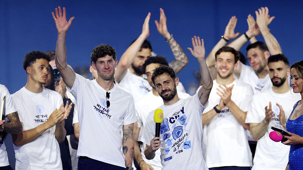 John Stones and Bernardo Silva during Pep Guardiola's farewell party