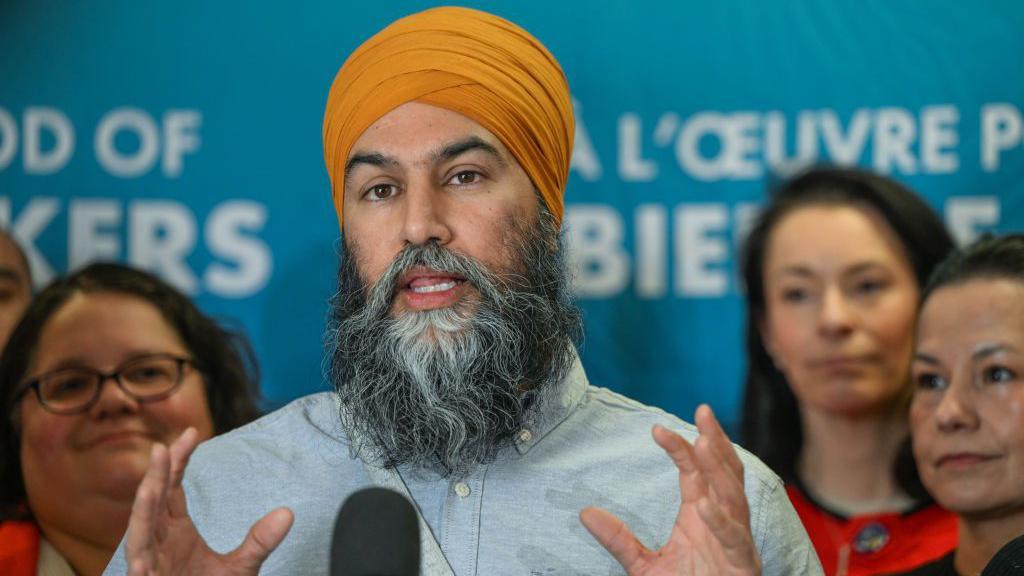 Canada's NDP leader, Jagmeet Singh, speaks to the media after delivering a keynote at the Canadian Labour Congress (CLC) Political Action Conference, held at Edmonton's Chateau Lacombe Hotel on February 20, 2025