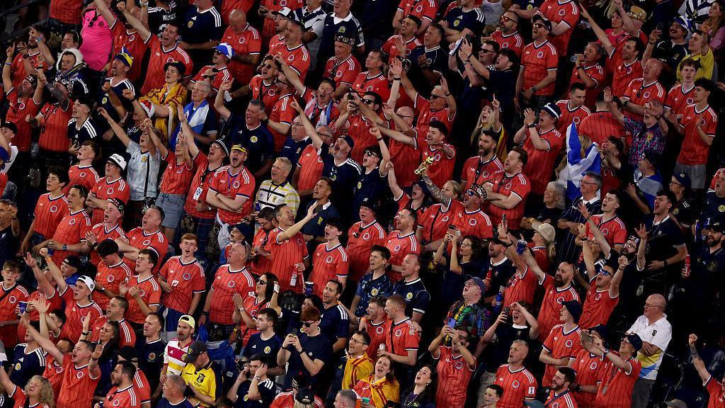 Scotland fans packed the Boston Stadium, many of them favouring the coral-coloured away top