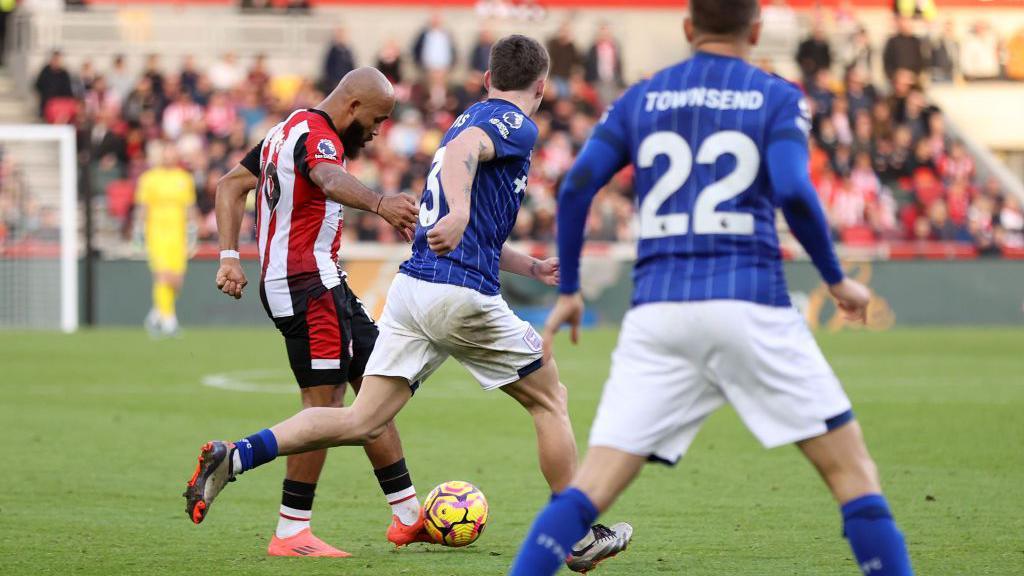 Bryan Mbeumo of Brentford scores his sides fourth goal during the Premier League match between Brentford FC and Ipswich Town FC at Gtech Community Stadium