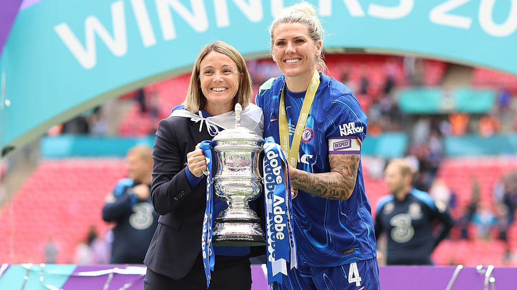 Sonia Bompastor and Millie Bright celebrating the FA Cup final win in 2025