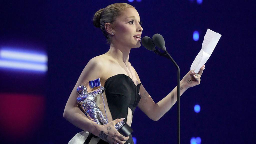 Ariana Grande accepting the Best Pop Award for 'Brighter Days Ahead'.