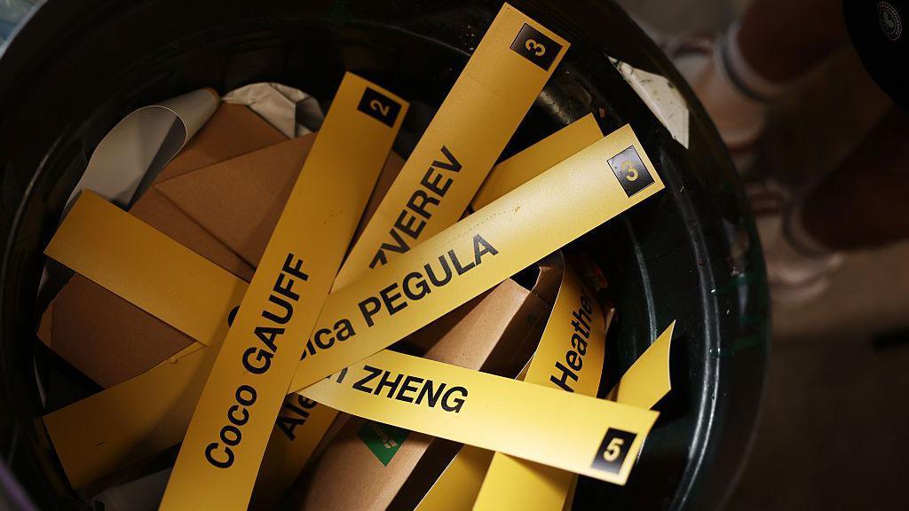 The name tag of Coco Gauff from the draw board is seen in a bin on day three of the championships