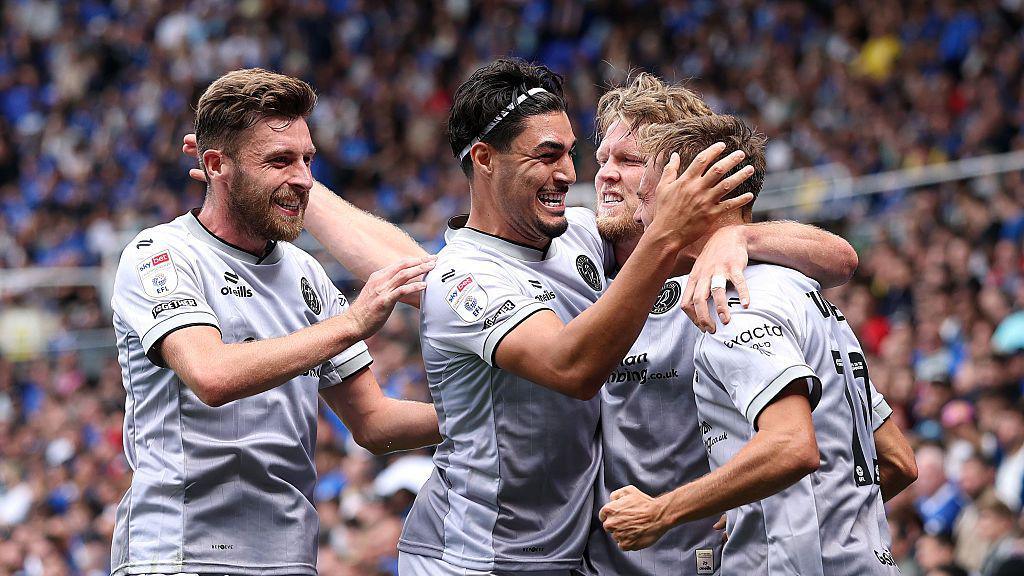 Scott Twine celebrates with his team-mates after scoring against Birmingham City.
