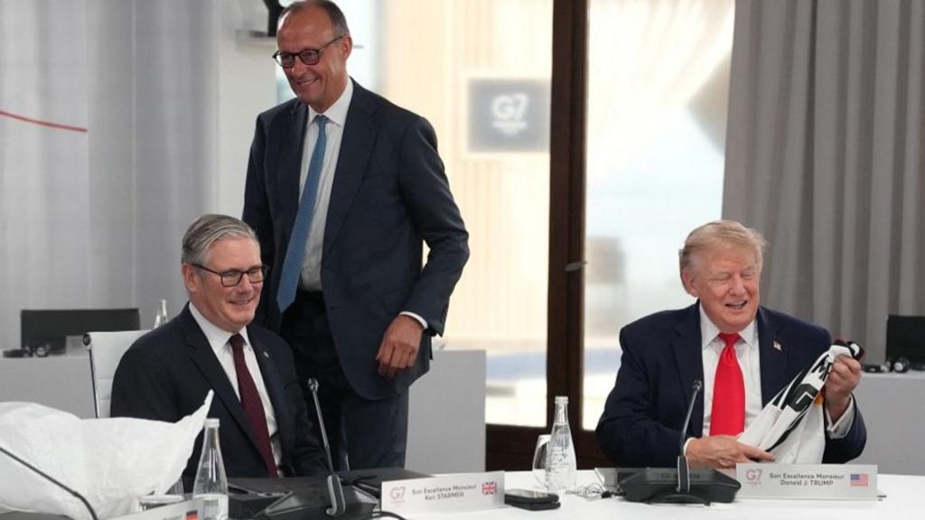 Sir Keir Starmer, German Chancellor Friedrich Merz and President Trump round a table at the G7 summit