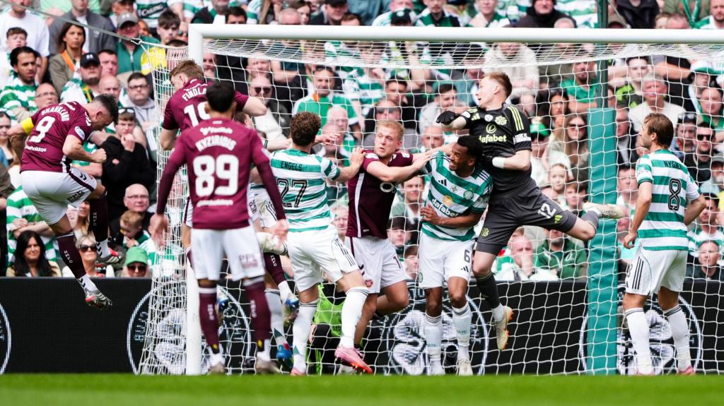 Lawrence Shankland scores for Hearts against Celtic