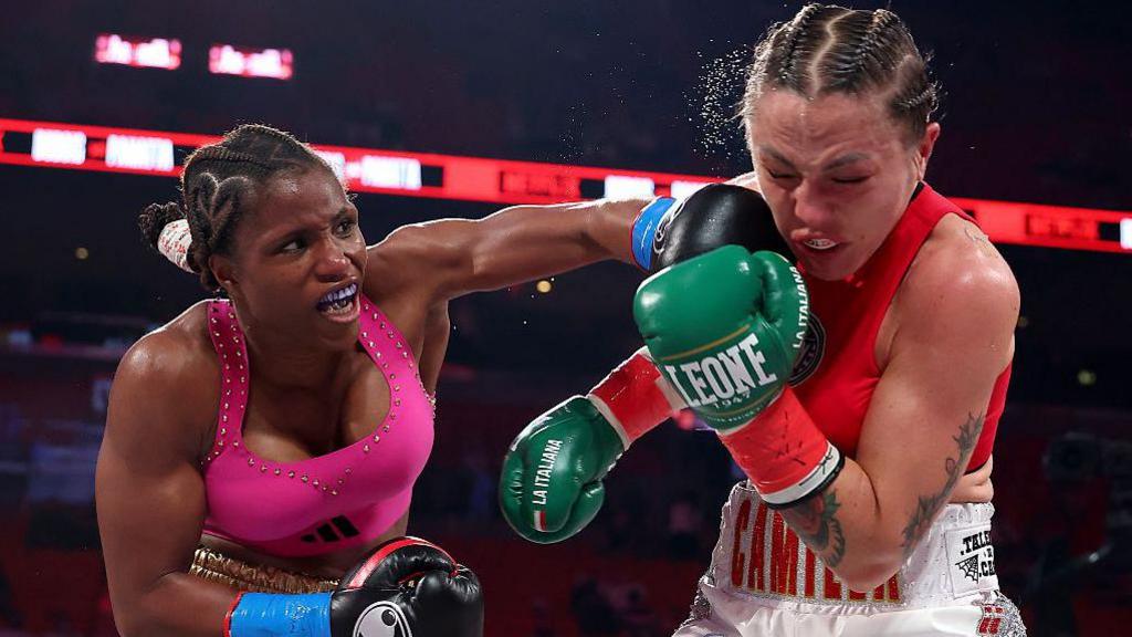 Caroline Dubois lands an overhand left against Dubois against Camilla Panatta