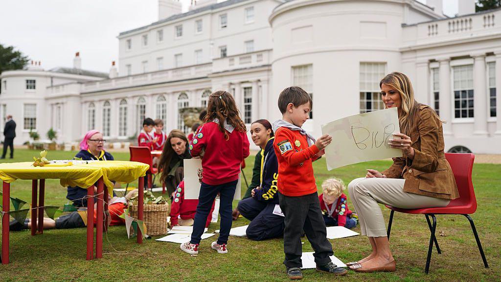 First Lady Melania Trump and Catherine, Princess of Wales speak with members of the Scouts Squirrels programme in the grounds of Frogmore Cottage, during the State visit by the President of the United States of America and U.S. First Lady Melania Trump