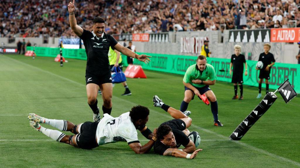 New Zealand score a try against Fiji