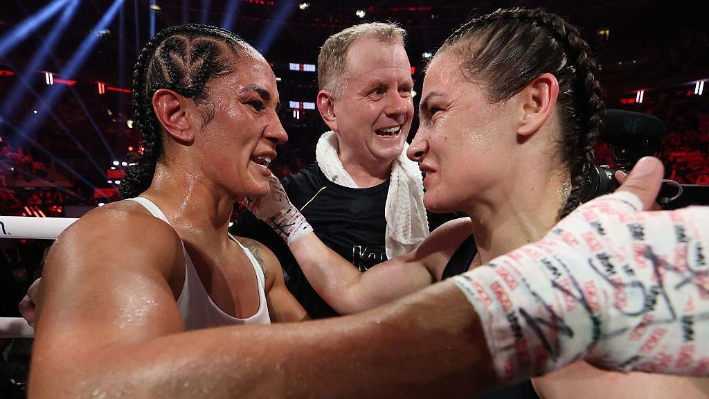Amanda Serrano and Katie Taylor embrace