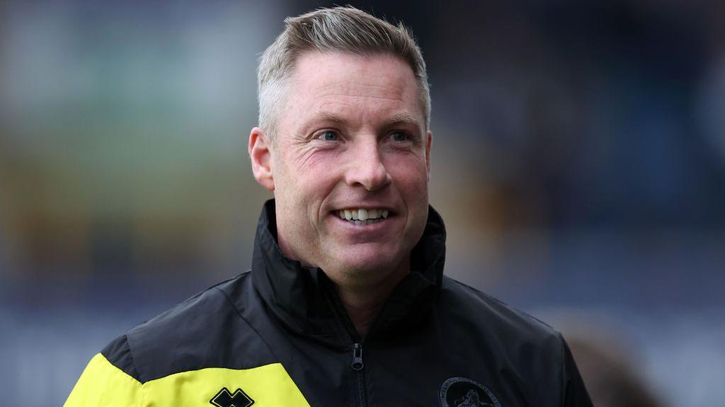 A smiling Millwall manager Neil Harris