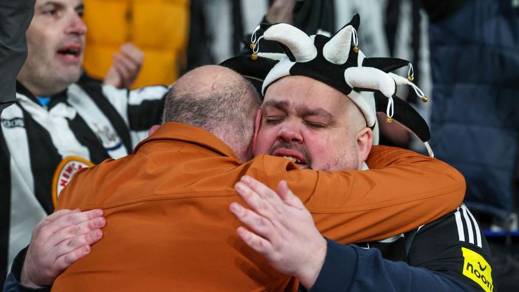 Newcastle fans show emotion after winning the Carabao Cup