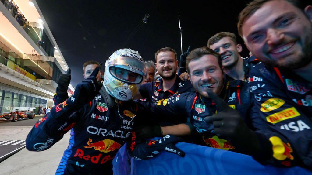 Max Verstappen celebrates with his Red Bull crew in Qatar