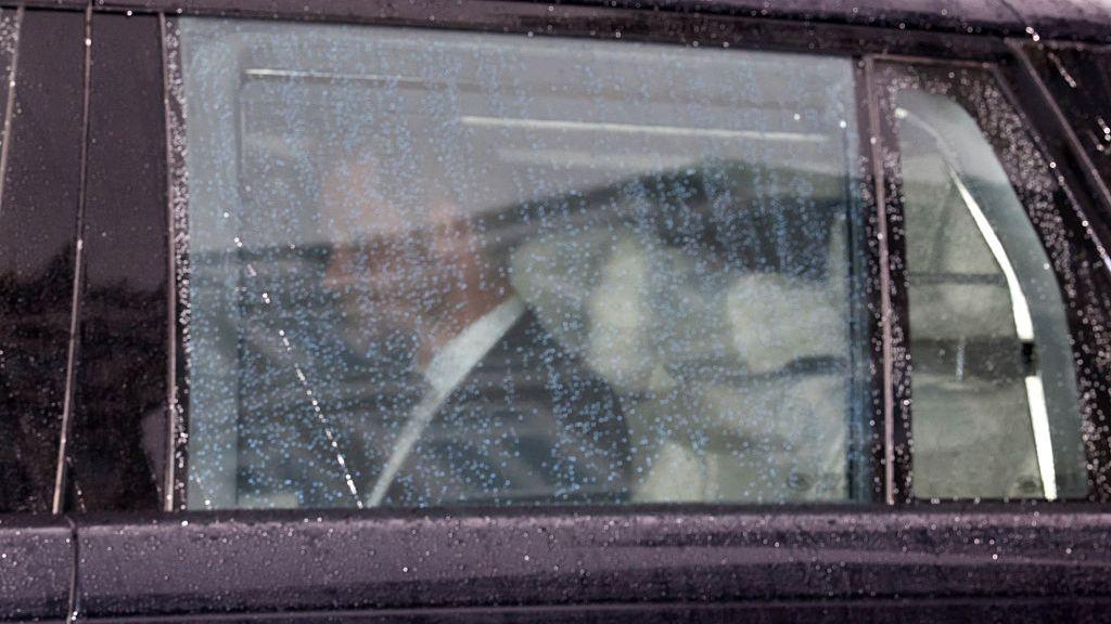 Duke of Sussex leaves Clarence House in London on 10 September in back of car after his meeting with King Charles 