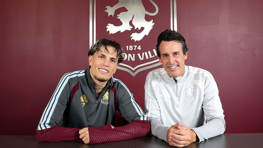 Alejandro Garnacho of Aston Villa poses for a picture with Unai Emery