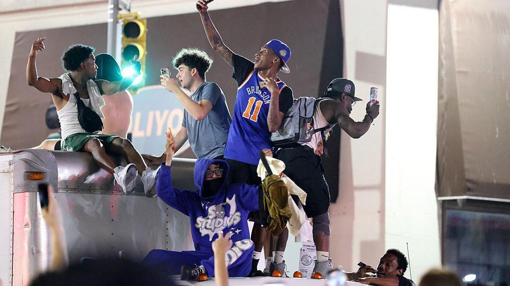 New York Knicks fans celebrate their side's big win