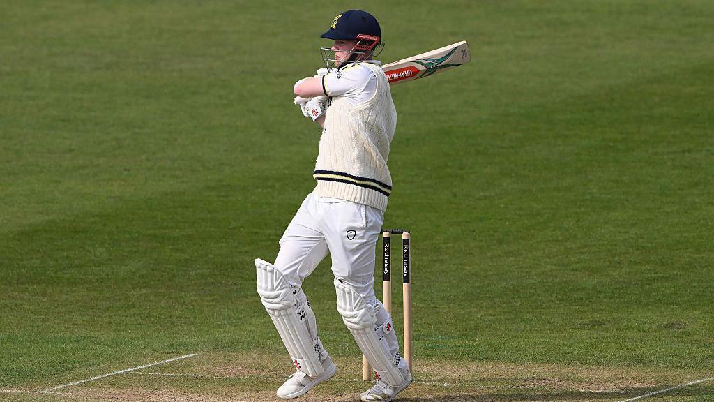 Dan Mousley pulls the ball batting for Warwickshire