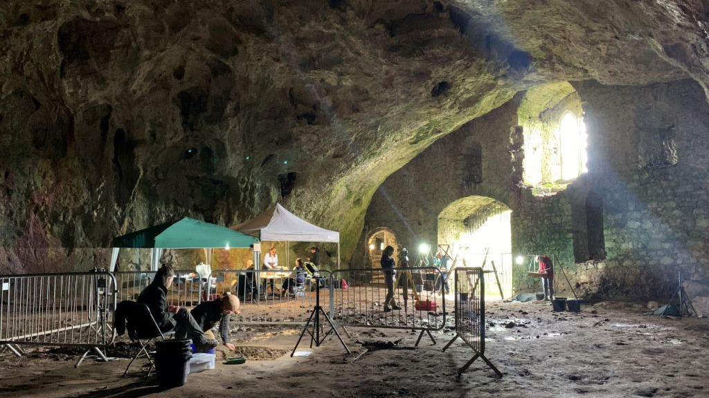 Experts working at the site.