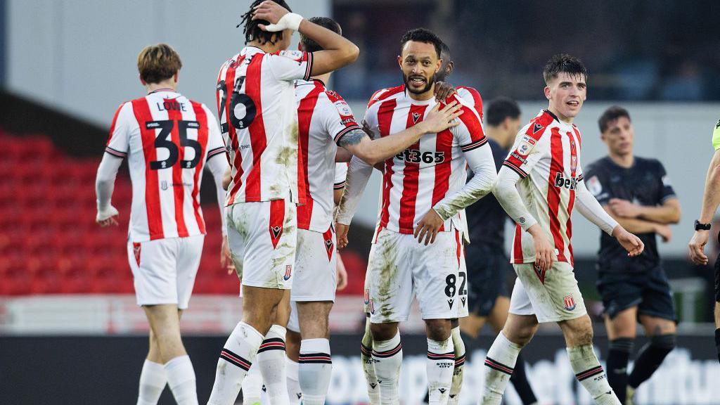 Stoke players celebrate Lewis Baker's wonder goal