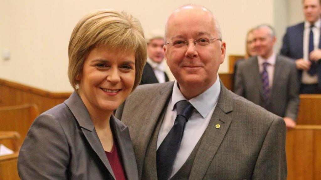 Nicola Sturgeon with Peter Murrell as she was officially sworn in as first minister in the Court of Session in 2014.