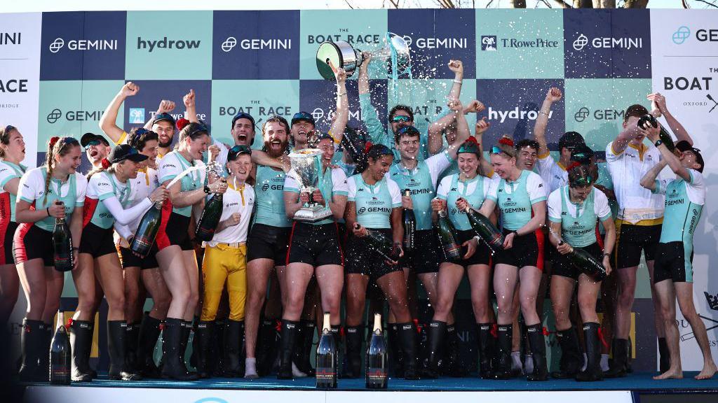 Cambridge University men's and women's teams celebrate winning the boat race in 2024