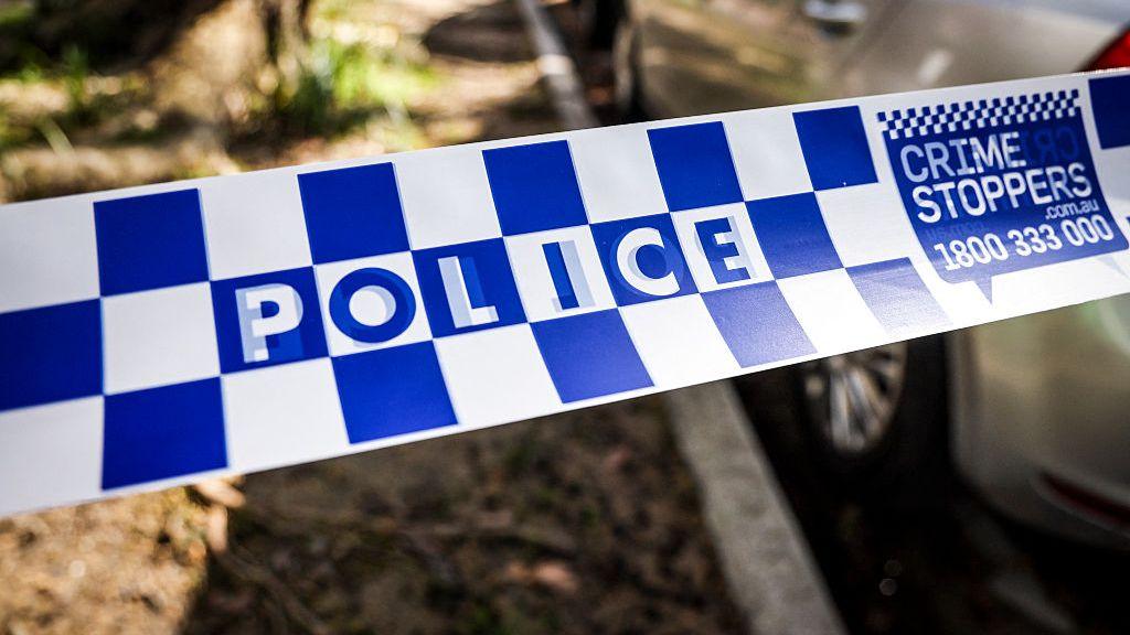 Blue and white chequered police tape
