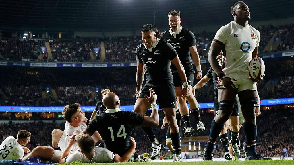 Mark Tele'a scores against England