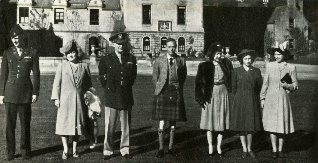 'Guests at Balmoral', October 1946. King George VI and Queen Elizabeth with daughters Princess Elizabeth (future Queen Elizabeth II) and Princess Margaret Rose, pose for a portrait with their guests General of the Army Eisenhower and his wife and son. 