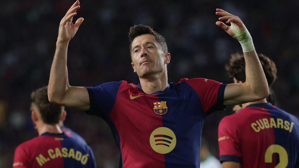 Robert Lewandowski celebrates scoring for Barcelona against Getafe