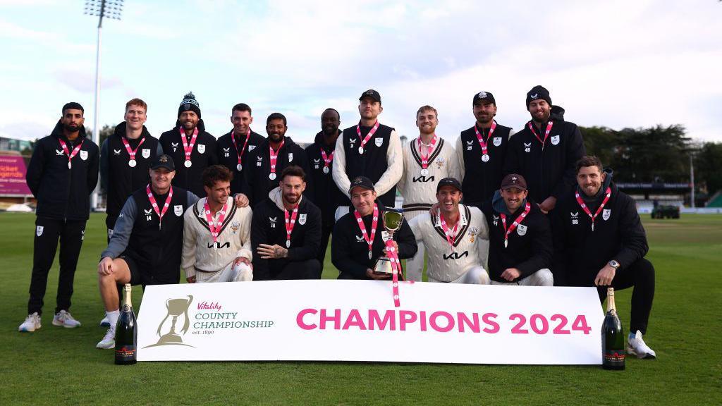 Surrey with the County Championship trophy