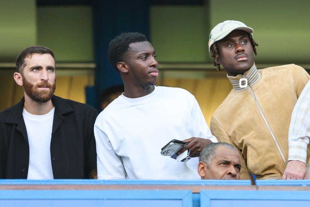 Trevoh Chalobah, right, and Eddie Nketiah, centre, watched Crystal palace's 1-1 draw with Chelsea after signing on transfer deadline day