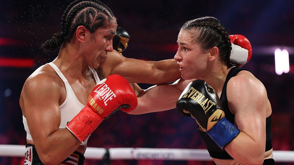 Amanda Serrano is punched by Katie Taylor