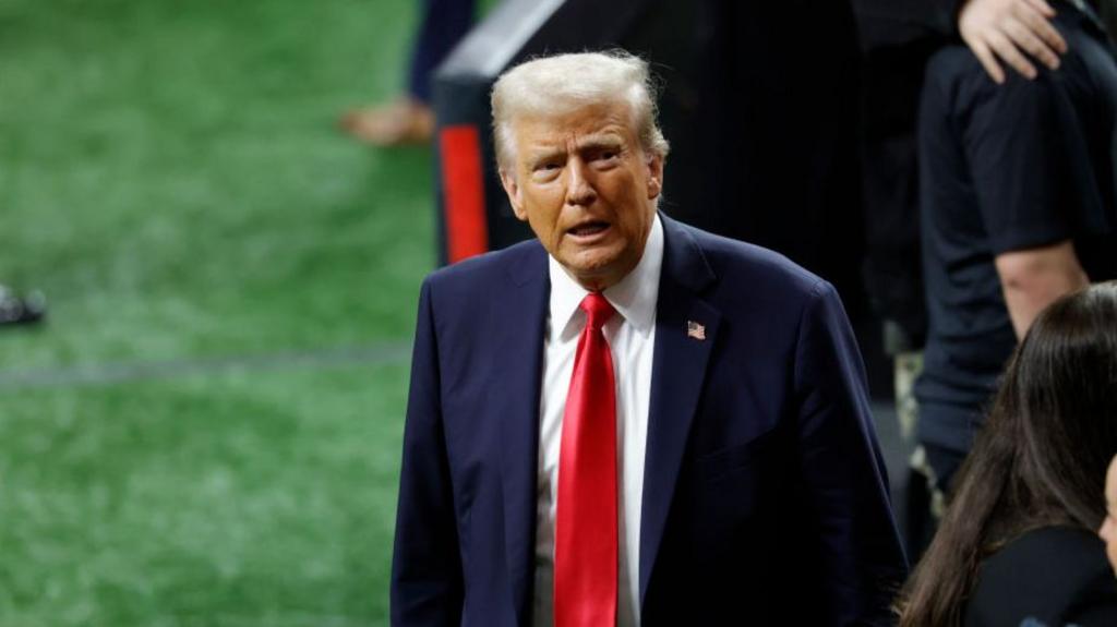 President Donald Trump walks on the field during Super Bowl LIX between the Philadelphia Eagles and the Kansas City Chiefs on February 09, 2025