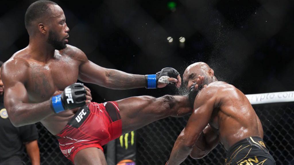 Leon Edwards head kicks Kamaru Usman in August 2022