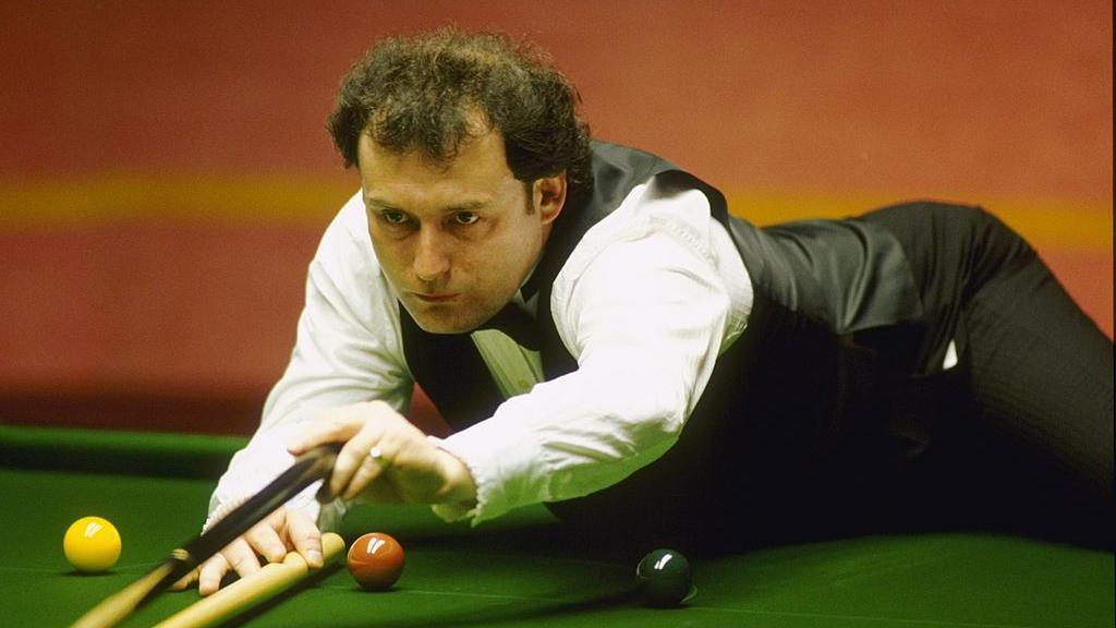 Jimmy White lines up a shot during the 1994 Embassy World Snooker Championships at the Crucible Theatre