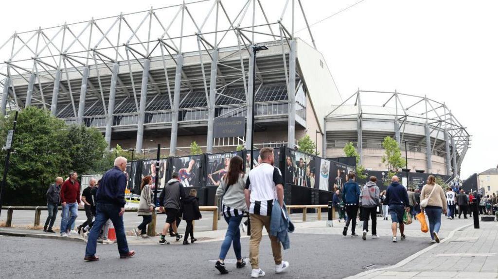 Fans walking in to St James' Park