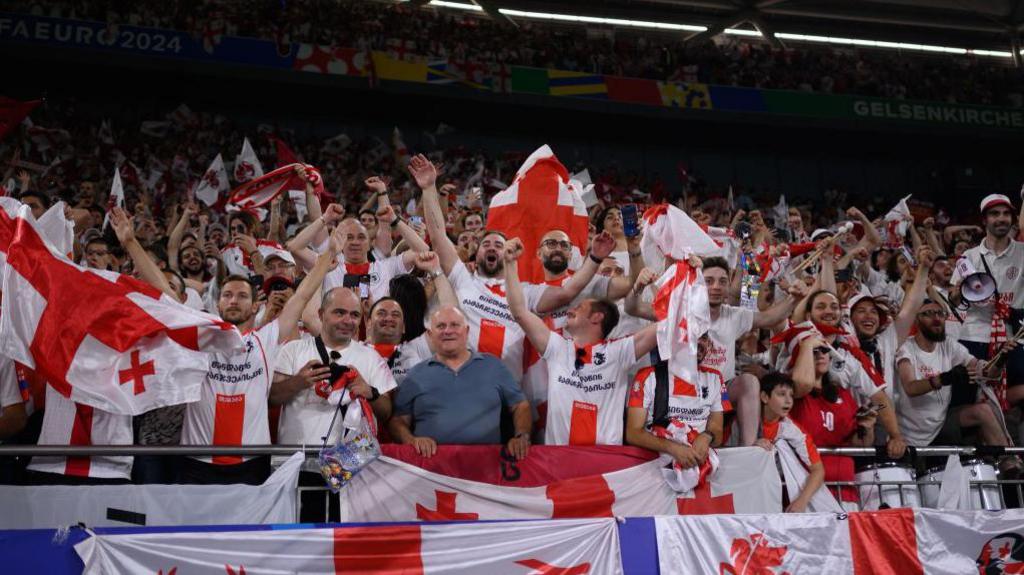 Georgia celebrate after beating Portugal