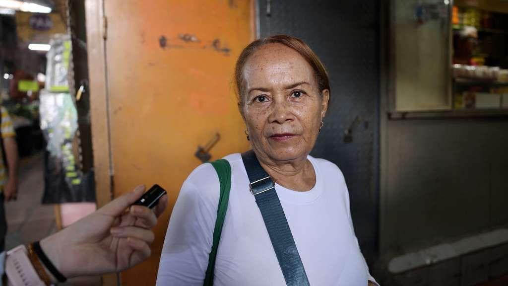 Consuelo looks at the camera while being interviewed