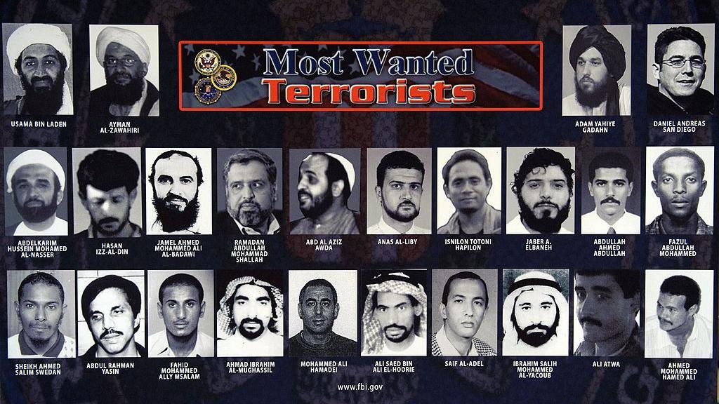 A most wanted poster showing 24 of the most wanted terrorists in the US