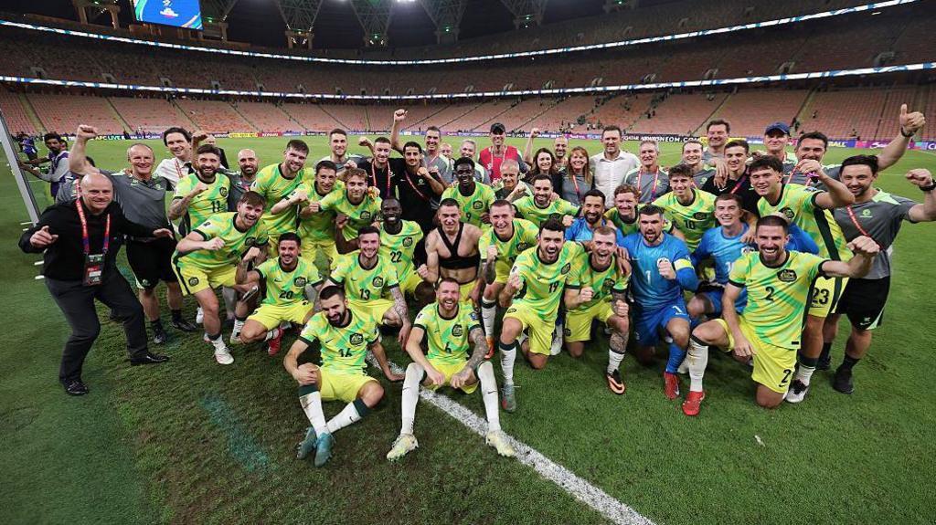 The Socceroos celebrate beating Saudi Arabia to qualify for the 2026 World Cup