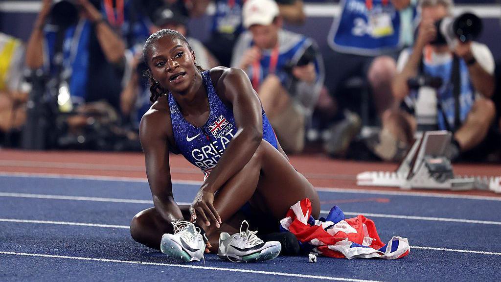Bronze medalist Dina Asher-Smith of Great Britain looks on after the Women's 200 Metres Final