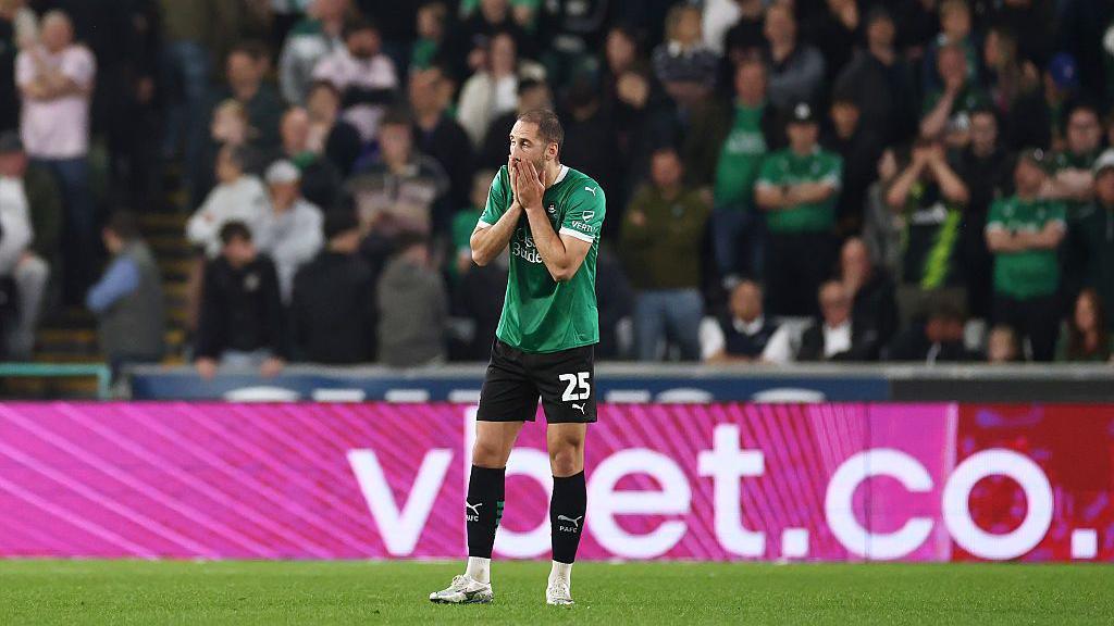 Nikola Katic of Plymouth reacts after conceding goal