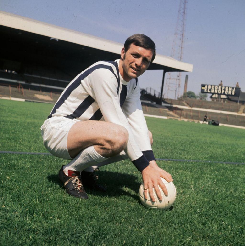 West Brom striker Jeff Astle holds a ball while posing for a photo in 1970