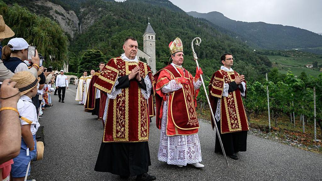 Spanish-born traditionalist Catholic Bishop of the Society of Saint Pius X (SSPX) Alfonso de Galarreta walks during a procession prior to the schismatic consecration of bishops by the traditionalist Catholic Society of Saint Pius X (SSPX) in Écône, western Switzerland, on July 1, 2026