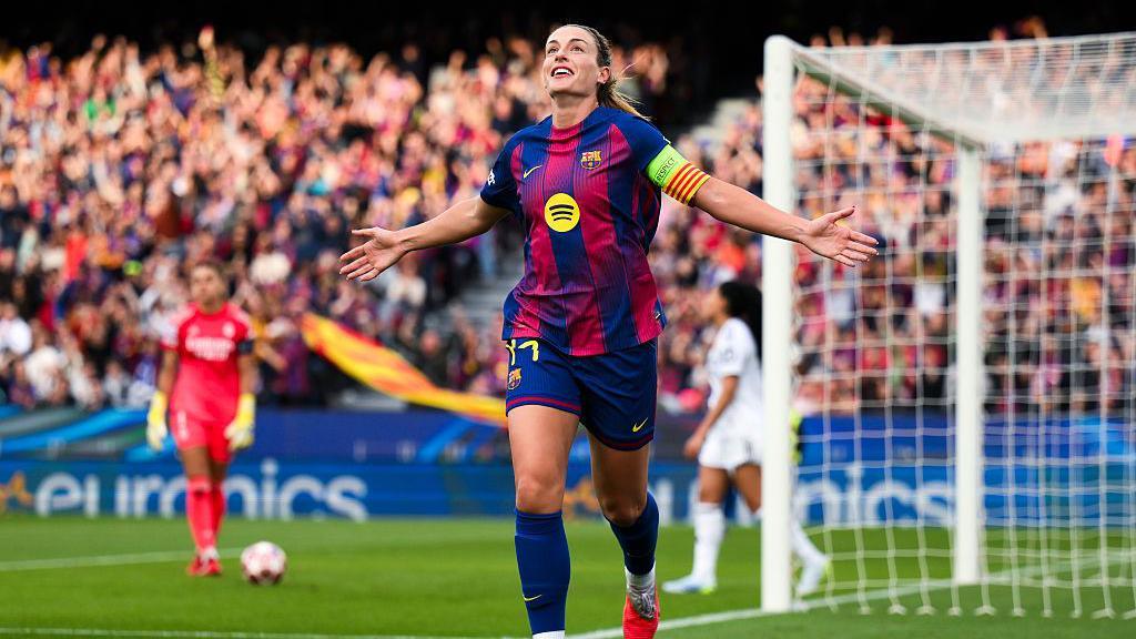 Alexia Putellas celebrates scoring a goal. 