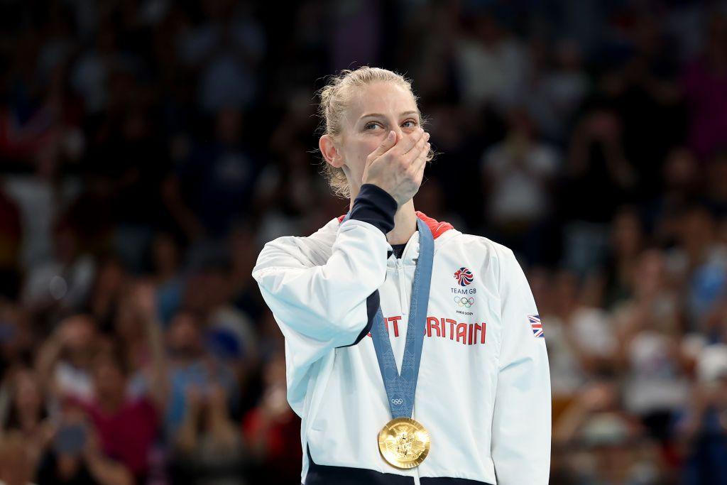 Gold medalist Bryony Page of Team Great Britain reacts on the podium