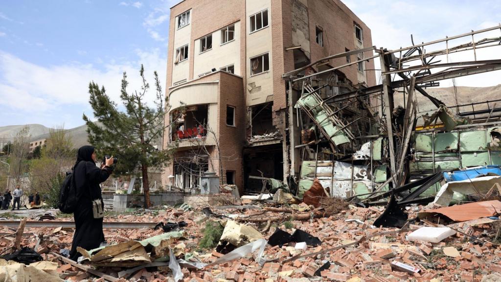 A photographer captures the damage after US-Israeli airstrikes on the Shahid Beheshti University, in Tehran, Iran