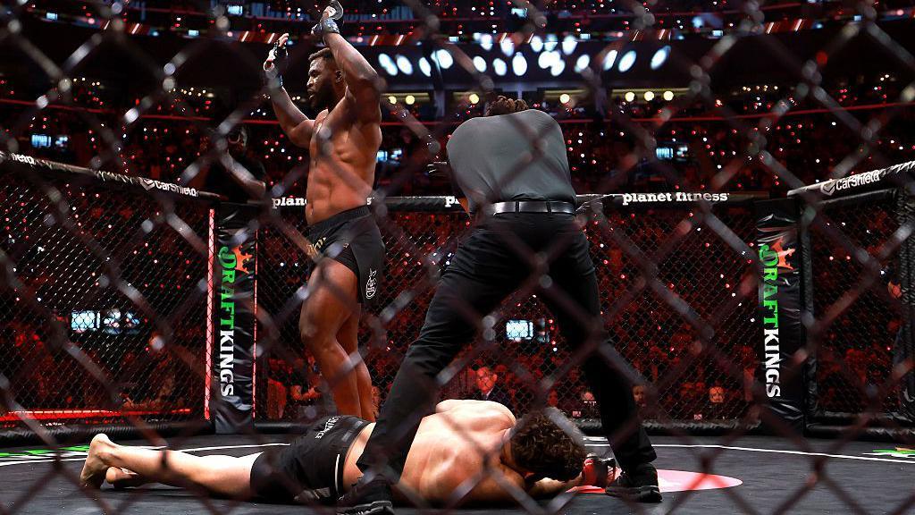 Francis Ngannou stands over a knocked out Philipe Lins