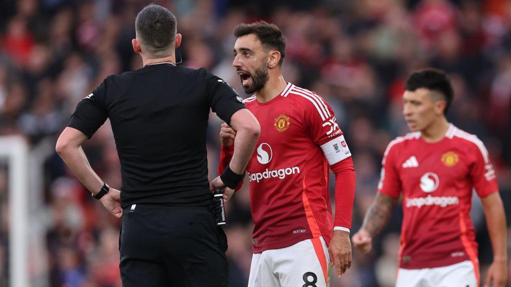 Bruno Fernandes shouts in the direction of referee Chris Kavanagh